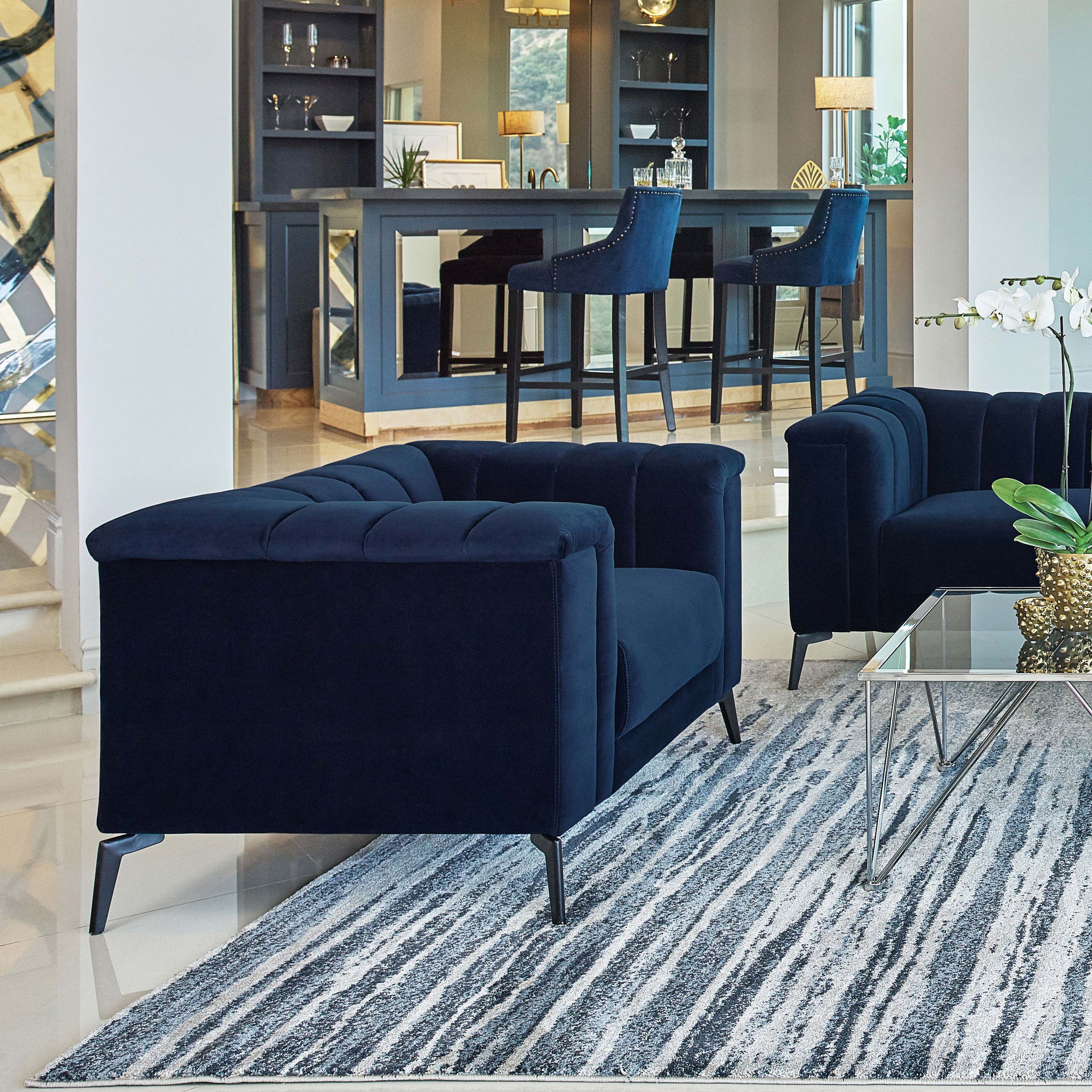 Sillón azul tipo esmoquin Chalet